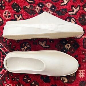 Elegant White Mules by WOLF & SHEPHERD